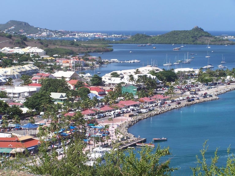 View over Marigot's red-roofed waterfront and marina on the French side of St. Martin