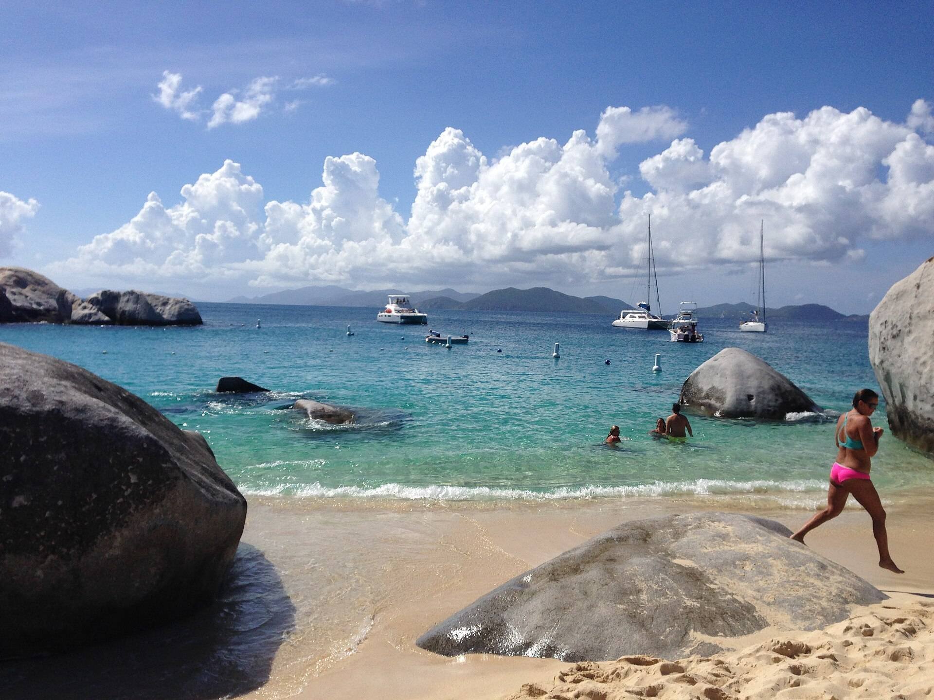 Swimmers among the granite boulders at The Baths, Virgin Gorda
