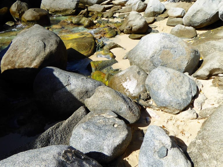 Giant granite boulders on the sand at The Baths, Virgin Gorda