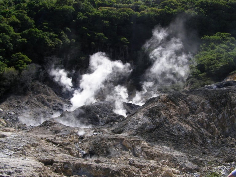 Steam rising from volcanic vents at the Sulphur Springs near Soufrière, St. Lucia